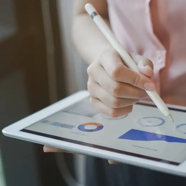 close-up on businesswoman manager using stylus pen for writing